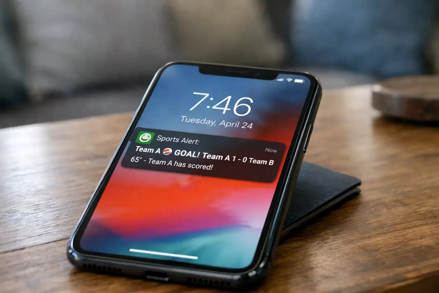 Smartphone che mostra notifica di gol durante partita